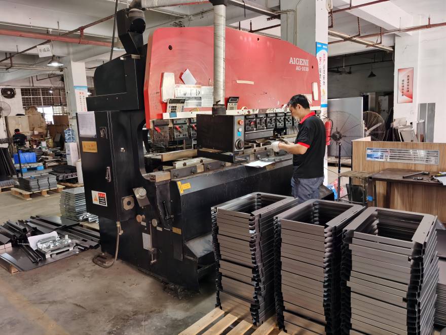 Metalworking equipment and stacked metal parts in the BEST workshop