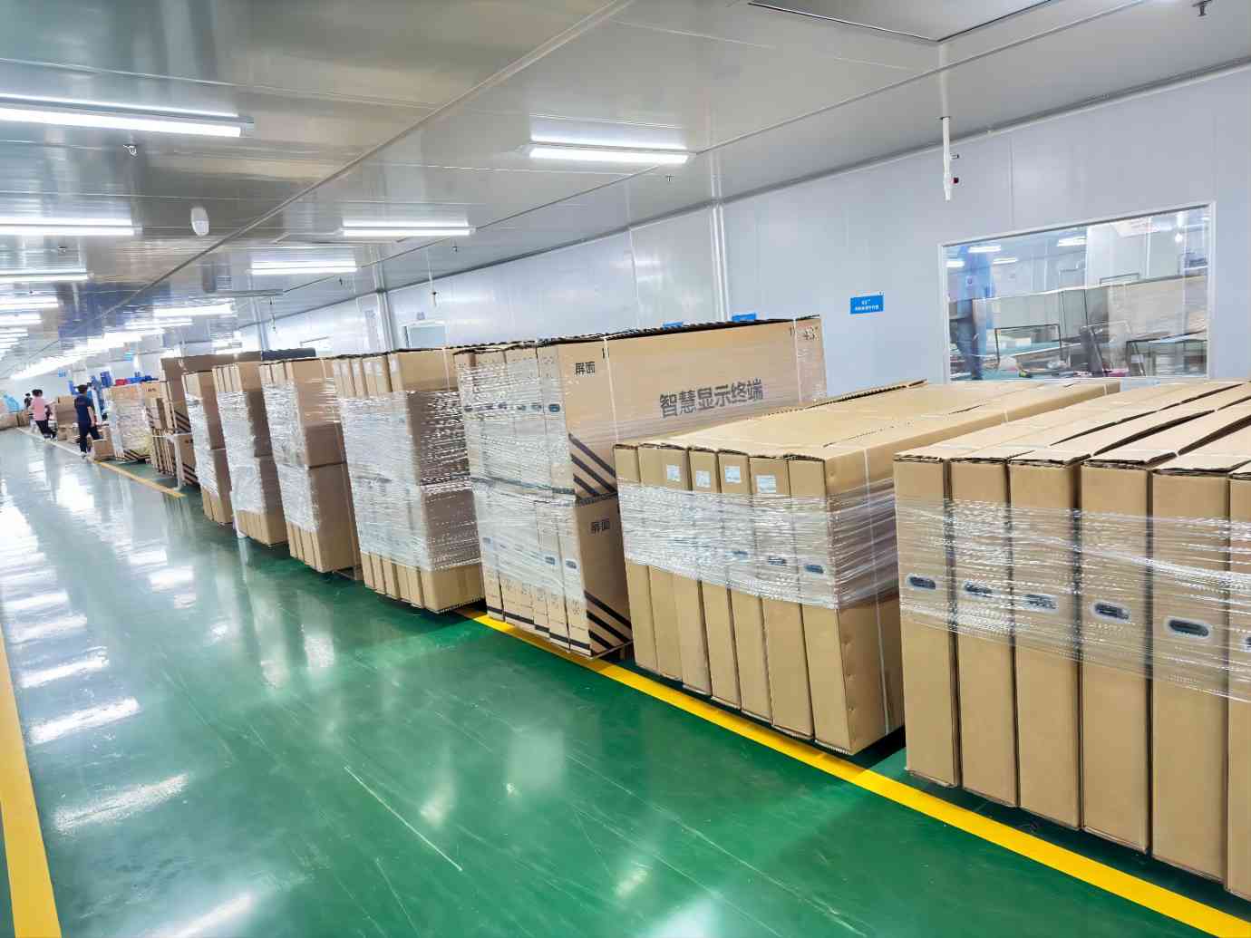 Rows of packaged equipment beside an aisle in the BEST facility